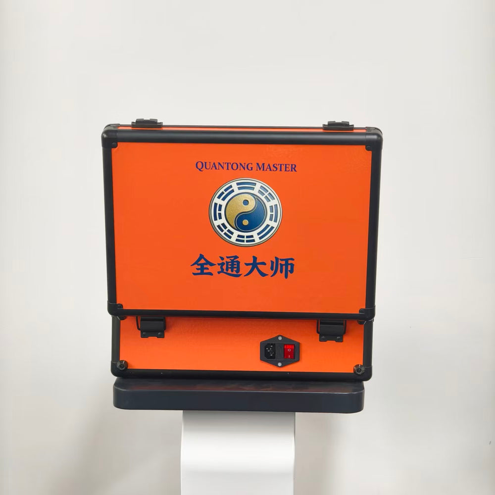 Rear view of the closed orange QuanTong Master QT-68 case showing the AC power inlet.