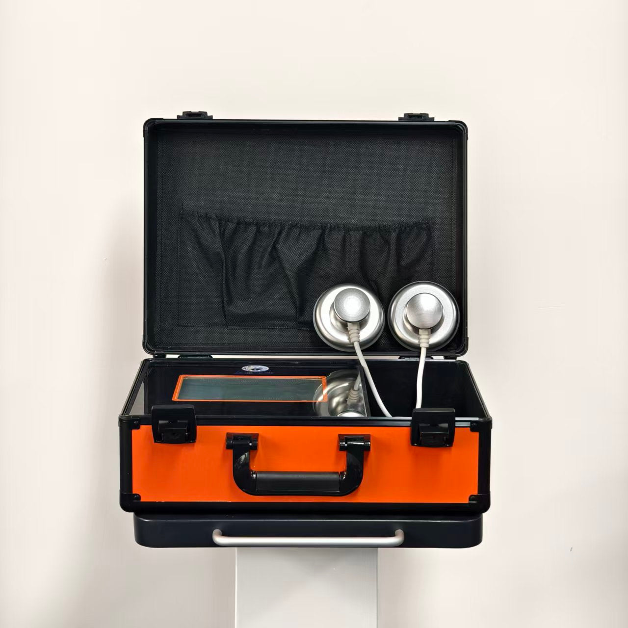 QuanTong Master QT-68 open carry case, front view, with touchscreen control panel and two round stainless-steel massage heads